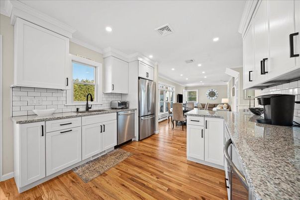 Dining room, Interior, Kitchen, Recessed Lighting, Stainless Steel Appliances, Wood Texture Flooring
