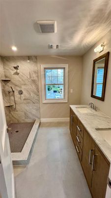 Bathroom, Dual Sink Vanities, Interior, Marble Walls, Recessed Lighting