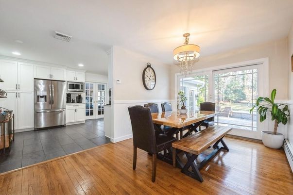 Chandelier, Dining room, Interior, Kitchen, Recessed Lighting, Stainless Steel Appliances, Wood Texture Flooring