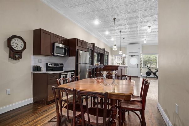 Dining room, Interior, Kitchen, Pendant Lights, Recessed Lighting, Stainless Steel Appliances, Wood Texture Flooring