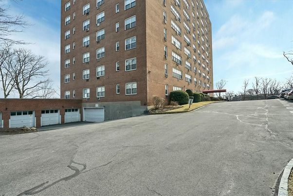 Attached, Exterior, Facade, Brick Facade, Condo Building