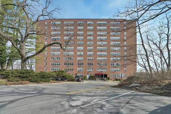 Exterior, Facade, Brick Facade, Condo Building