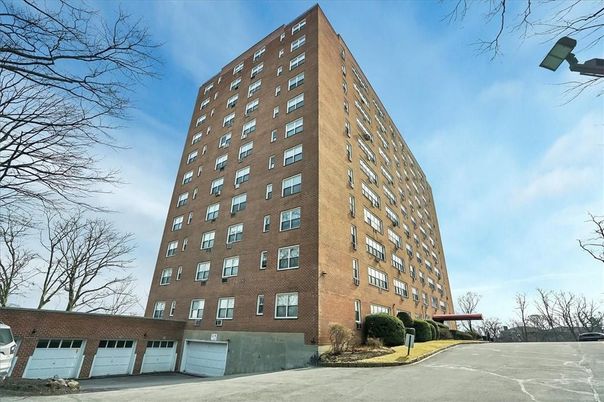 Attached, Exterior, Facade, Brick Facade, Condo Building
