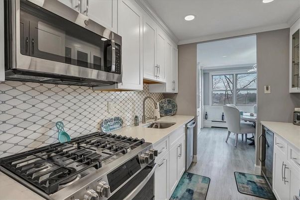 Dining room, Interior, Kitchen, Recessed Lighting, Stainless Steel Appliances, Wood Texture Flooring