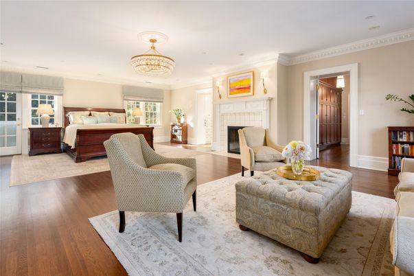 Bedroom, Chandelier, Fireplace, Interior, Recessed Lighting, Wood Texture Flooring