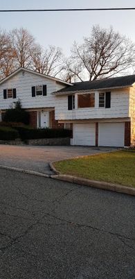 Attached, Exterior, Facade, Raised Ranch