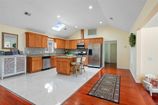 Interior, Kitchen, Marble, Recessed Lighting, Stainless Steel Appliances, Wood Texture Flooring
