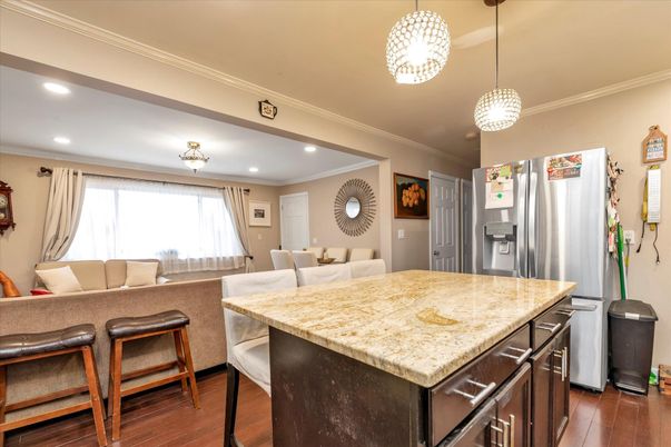 Dining room, Interior, Kitchen, Pendant Lights, Recessed Lighting, Stainless Steel Appliances, Wood Texture Flooring