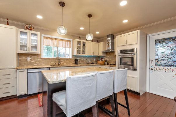 Interior, Kitchen, Pendant Lights, Recessed Lighting, Stainless Steel Appliances, Wood Texture Flooring