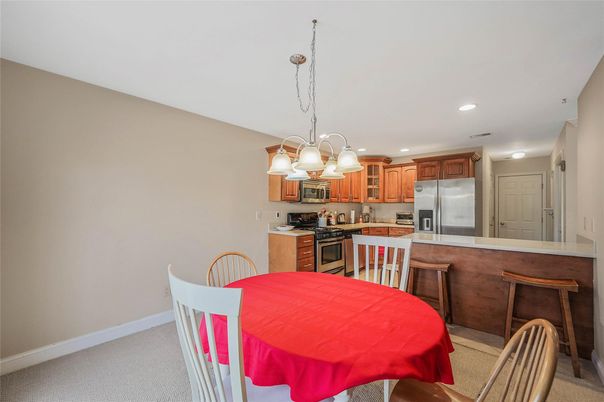Chandelier, Dining room, Interior, Kitchen, Pendant Lights, Recessed Lighting, Stainless Steel Appliances
