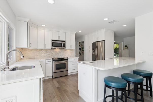 Interior, Kitchen, Recessed Lighting, Stainless Steel Appliances, Wood Texture Flooring