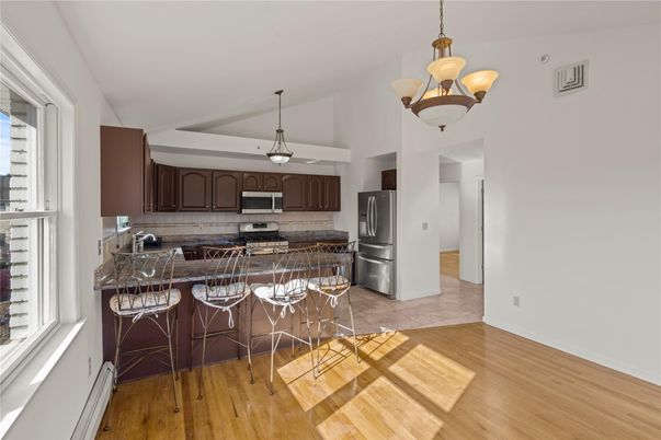 Chandelier, Interior, Kitchen, Pendant Lights, Stainless Steel Appliances, Wood Texture Flooring