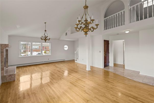 Chandelier, Empty room, Fireplace, Interior, Wood Texture Flooring