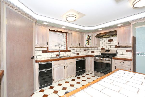 Interior, Kitchen, Recessed Lighting, Stainless Steel Appliances, Tile Countertops