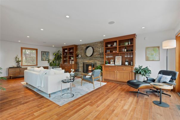 Fireplace, Interior, Living room, Recessed Lighting, Stone Walls, Wood Texture Flooring