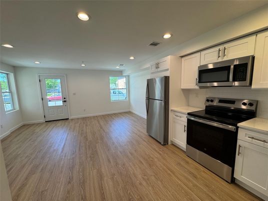 Interior, Kitchen, Recessed Lighting, Stainless Steel Appliances, Wood Texture Flooring
