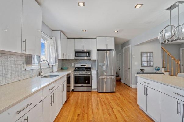 Interior, Kitchen, Pendant Lights, Recessed Lighting, Stainless Steel Appliances, Wood Texture Flooring