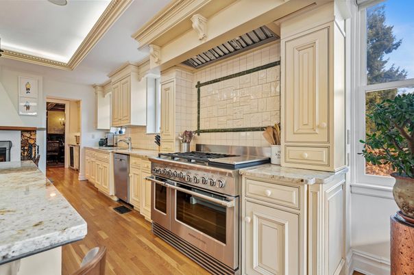 Fireplace, Interior, Kitchen, Stainless Steel Appliances, Wood Texture Flooring