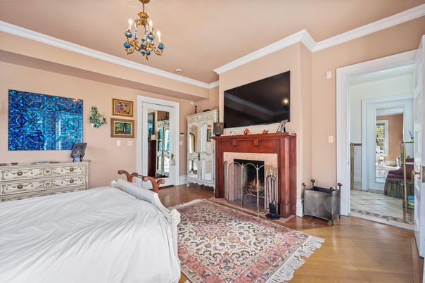 Bedroom, Chandelier, Fireplace, Interior, Wood Texture Flooring