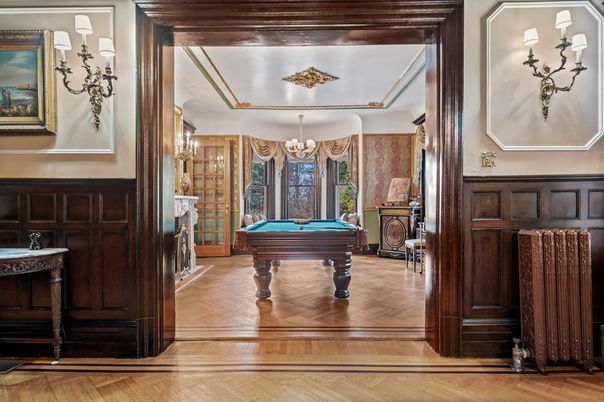 Billiard Table, Chandelier, Fireplace, Game Room, Interior, Wood Texture Flooring