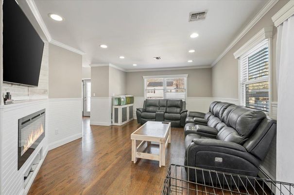 Fireplace, Interior, Living room, Recessed Lighting, Wood Texture Flooring