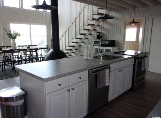 Dining room, Interior, Kitchen, Pendant Lights, Stainless Steel Appliances, Wood Texture Flooring