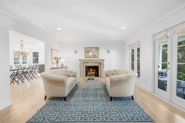 Chandelier, Dining room, Fireplace, Interior, Living room, Recessed Lighting, Wood Texture Flooring
