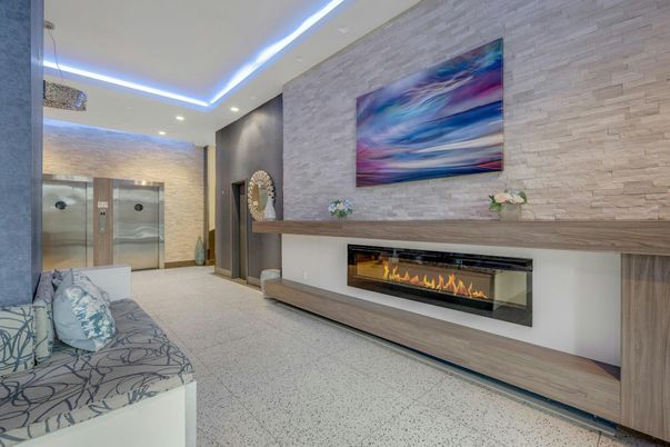 Elevator, Fireplace, Interior, Recessed Lighting, Stone Walls