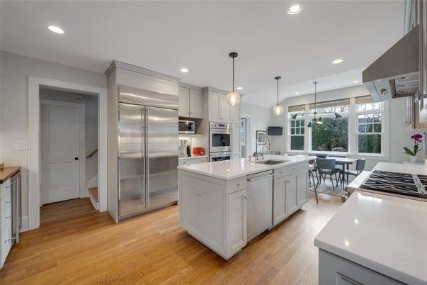 Dining room, Interior, Kitchen, Pendant Lights, Recessed Lighting, Stainless Steel Appliances, Wood Texture Flooring