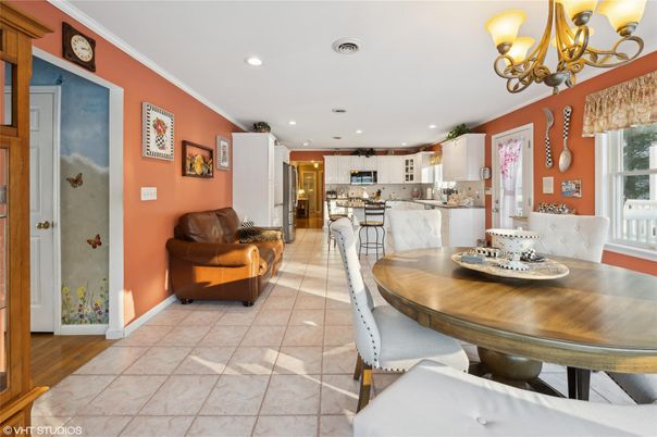 Chandelier, Dining room, Interior, Kitchen, Recessed Lighting, Stainless Steel Appliances, Wood Texture Flooring