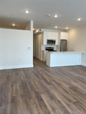 Interior, Kitchen, Recessed Lighting, Stainless Steel Appliances, Wood Texture Flooring