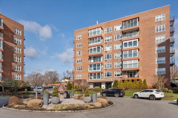 Exterior, Facade, Brick Facade, Condo Building