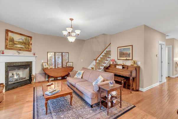 Chandelier, Fireplace, Interior, Living room, Piano, Wood Texture Flooring