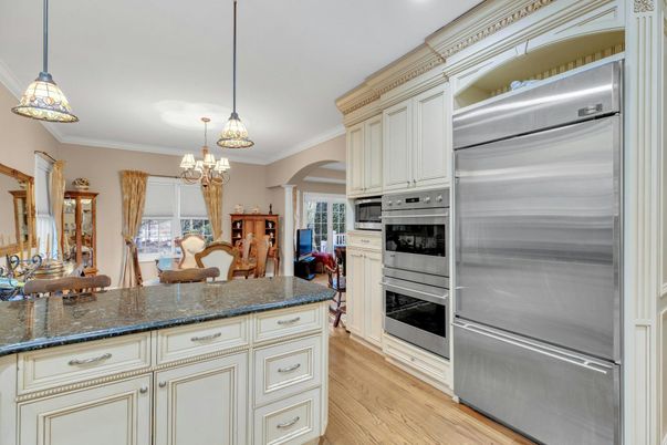 Chandelier, Interior, Kitchen, Pendant Lights, Recessed Lighting, Stainless Steel Appliances, Wood Texture Flooring