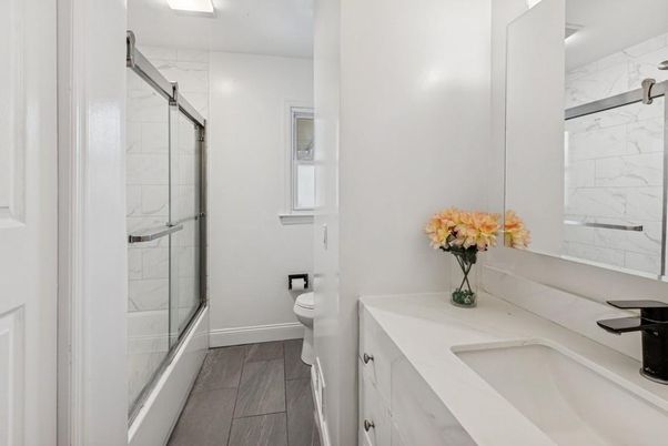Bathroom, Glass Shower, Interior, Marble Walls, Wood Texture Flooring
