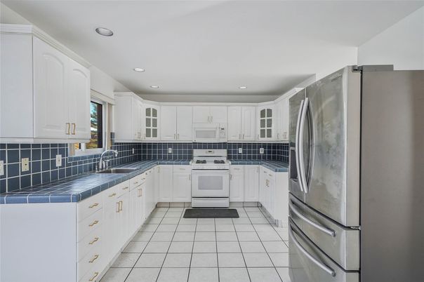 Interior, Kitchen, Recessed Lighting, Tile Countertops