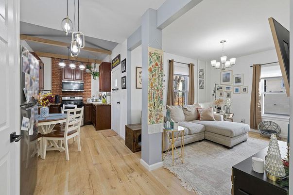 Chandelier, Dining room, Interior, Kitchen, Living room, Pendant Lights, Stainless Steel Appliances, Wood Texture Flooring