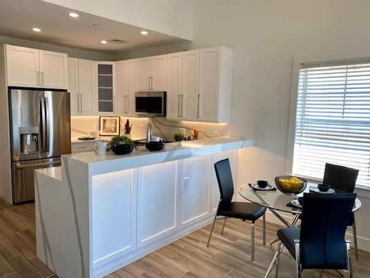 Dining room, Interior, Kitchen, Recessed Lighting, Stainless Steel Appliances, Wood Texture Flooring