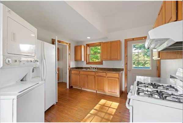 Interior, Kitchen, Recessed Lighting, Washer, Wood Texture Flooring