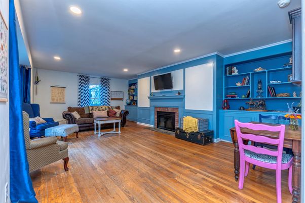 Dining room, Fireplace, Interior, Living room, Recessed Lighting, Wood Texture Flooring