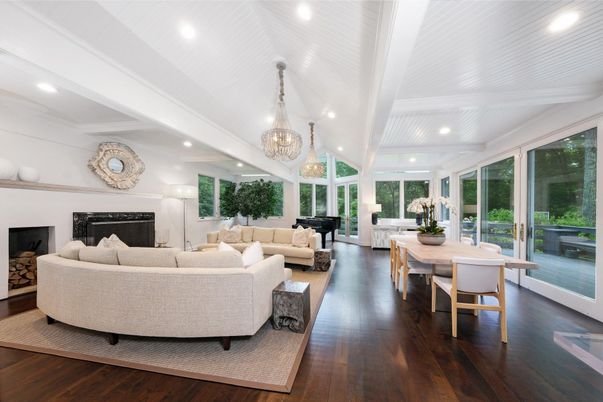 Chandelier, Dining room, Fireplace, Interior, Living room, Piano, Recessed Lighting, Wood Texture Flooring