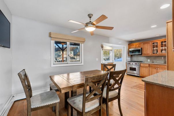 Dining room, Interior, Kitchen, Recessed Lighting, Stainless Steel Appliances, Wood Texture Flooring