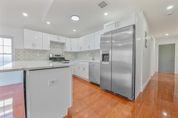 Interior, Kitchen, Recessed Lighting, Stainless Steel Appliances, Wood Texture Flooring