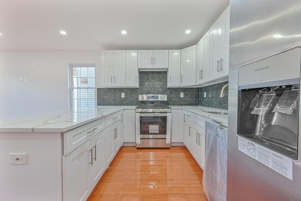 Interior, Kitchen, Recessed Lighting, Stainless Steel Appliances, Wood Texture Flooring