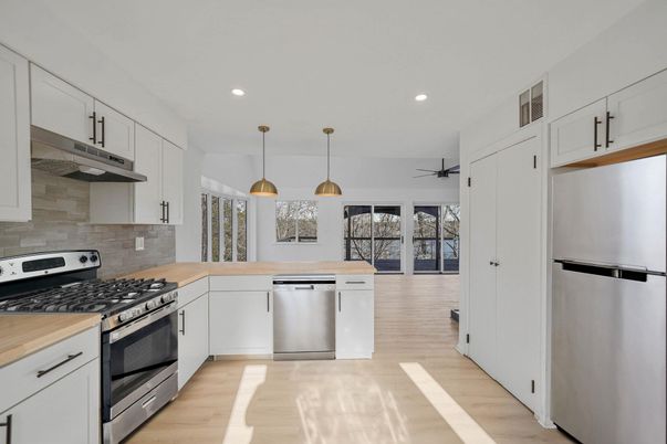 Interior, Kitchen, Pendant Lights, Recessed Lighting, Stainless Steel Appliances, Wood Texture Flooring