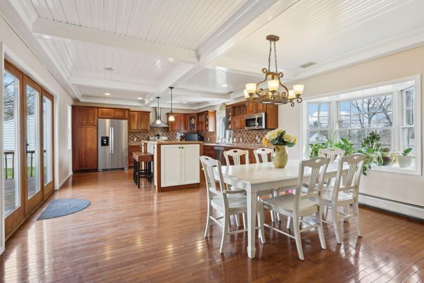 Chandelier, Dining room, Interior, Kitchen, Pendant Lights, Recessed Lighting, Stainless Steel Appliances, Wood Texture Flooring