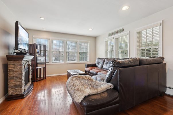 Fireplace, Interior, Living room, Recessed Lighting, Wood Texture Flooring