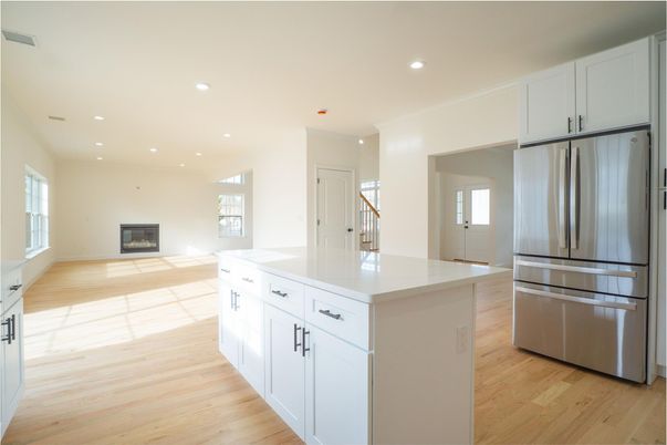 Fireplace, Interior, Kitchen, Recessed Lighting, Stainless Steel Appliances, Wood Texture Flooring