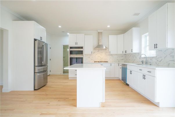 Interior, Kitchen, Marble Walls, Recessed Lighting, Stainless Steel Appliances, Wood Texture Flooring