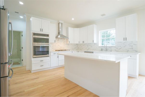 Interior, Kitchen, Marble Walls, Recessed Lighting, Stainless Steel Appliances, Wood Texture Flooring